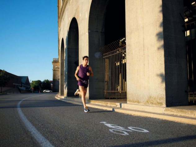 The Loop A man runs around the perimeter of Harvard Stadium