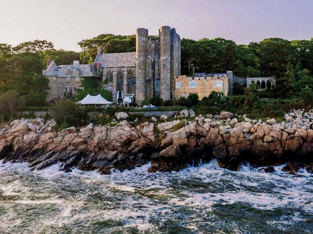 Majestic twentieth-century stone castle perched on Gloucester coastline