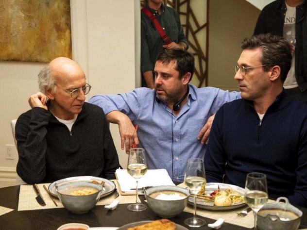 Producer Jeff Schaffer sits between star Larry David (left) and another cast member on the “Curb Your Enthusiasm” set.