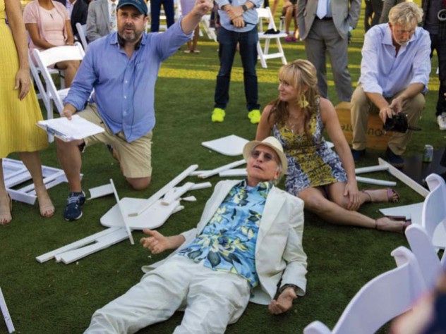 Schaffer directs a “Curb Your Enthusiasm” scene in which David lies on the ground surrounded by other cast members.