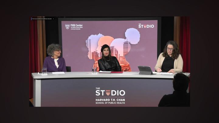 Healthcare panel showing three women sitting at a desk together