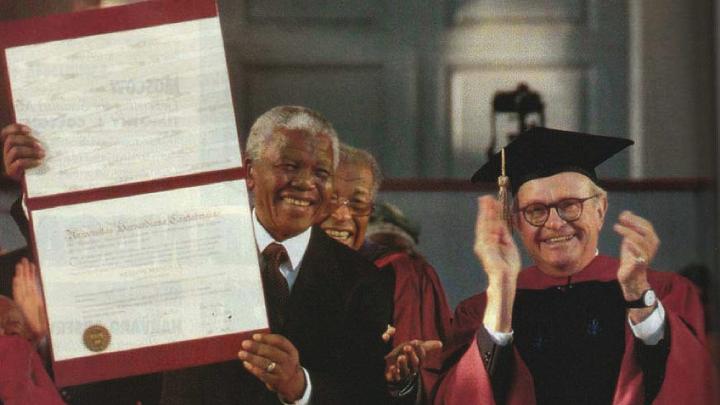 Photograph of Nelson Mandela receiving honorary degree and University Marshal Rick Hunt
