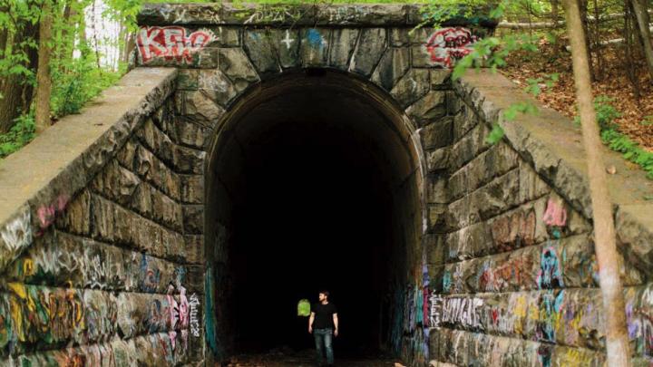 The “Clinton Train Tunnel,” built in 1903 near the Wachusett Reservoir, goes “from nowhere to nowhere.”