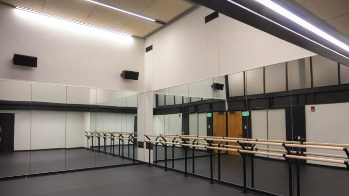 A dance studio with glass walls. 